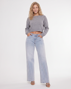 Comfortable wide jeans with mid waist and relaxed fit for women. 10