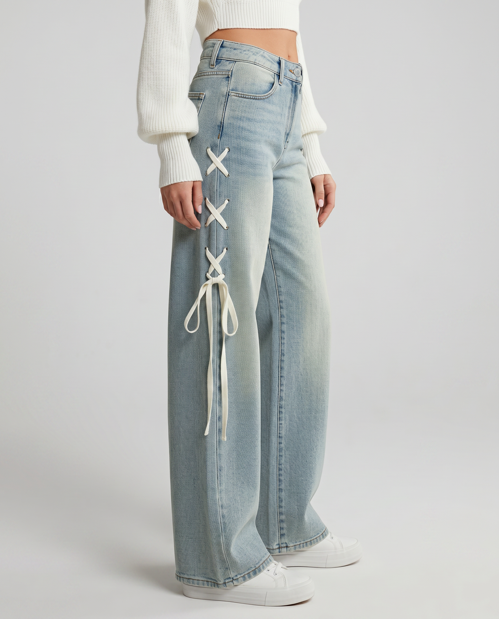 Stylish wide jeans with side laces in light blue denim. 3