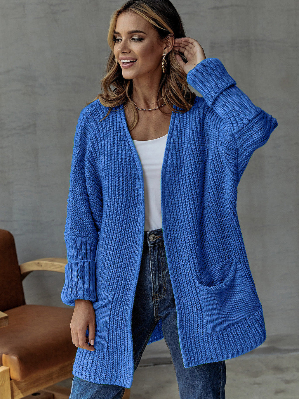 Women's comfortable cardigan with practical pockets in various colors.