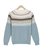 Cozy women's knitted sweater with Nordic pattern, perfect for any occasion. 4