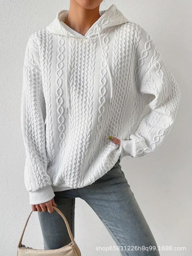 Women's oversized hoodie in various colors, perfect for layering and comfort.