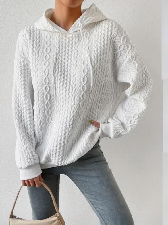 Women's oversized hoodie in various colors, perfect for layering and comfort. 2