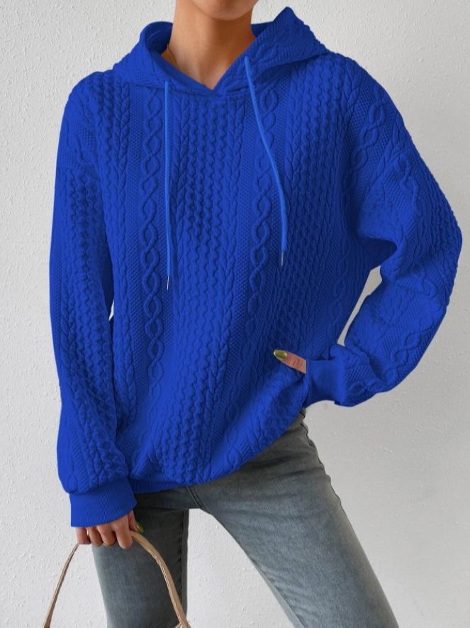 Women's oversized hoodie in various colors, perfect for layering and comfort. 6
