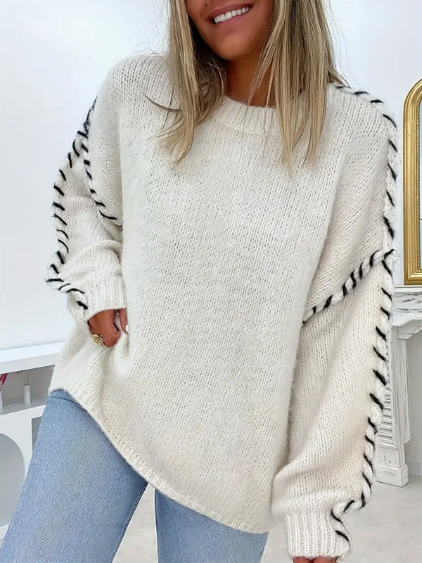 Women's comfortable oversized sweater with round neck in various colors.