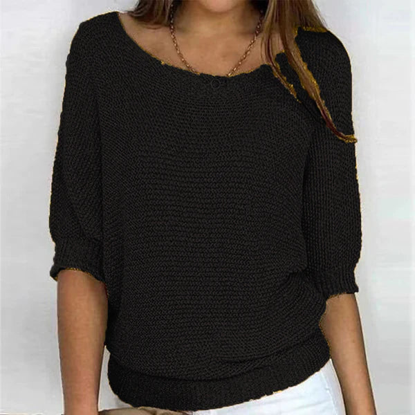 Comfortable women's sweater with boat neck design.