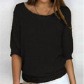 Comfortable women's sweater with boat neck design.