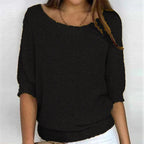 Comfortable women's sweater with boat neck design.